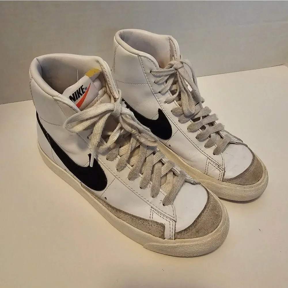 Nike leather hi top sneakers size 6. White with black swish